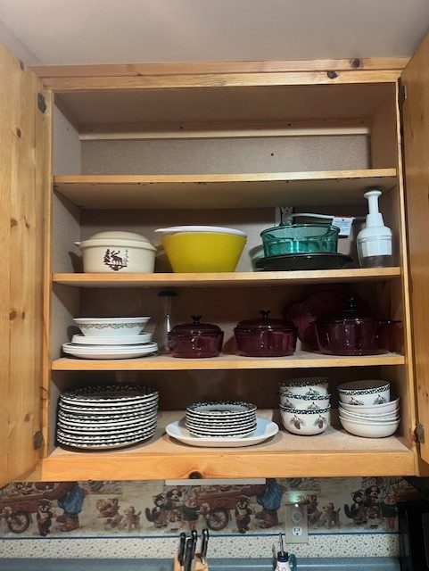Stocked cabinets and dishware